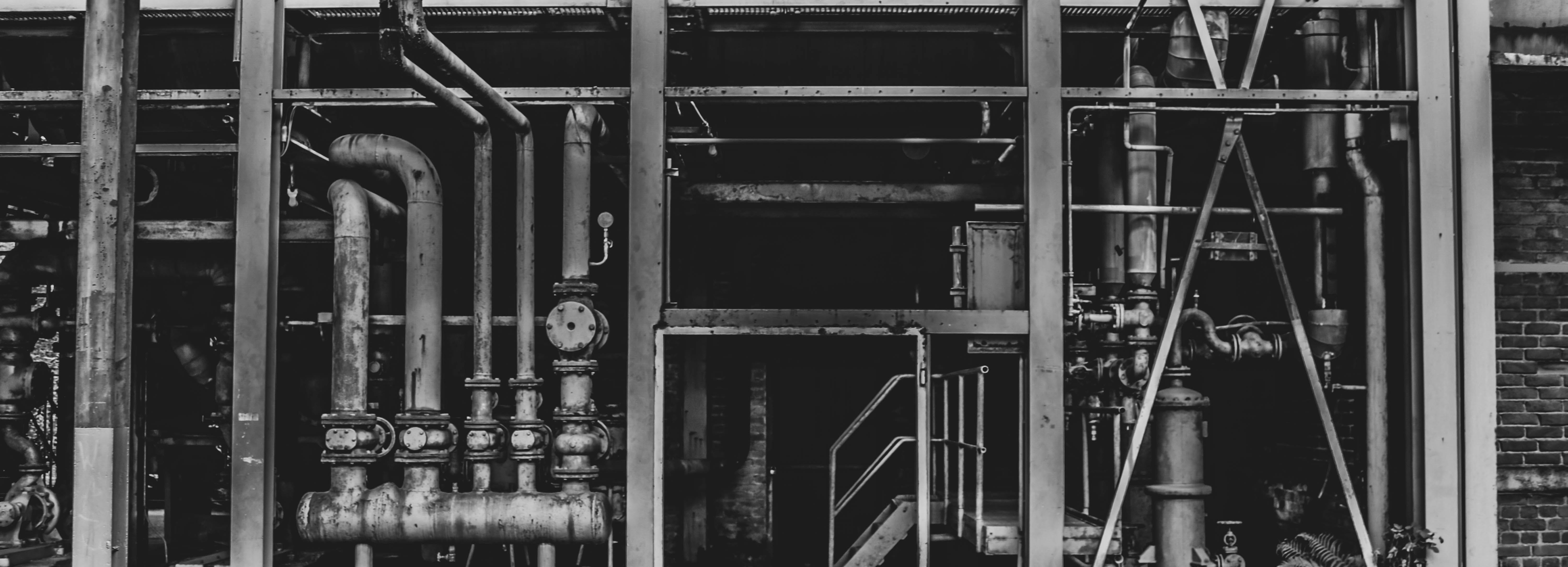 A desaturated picture of an old pipe factory